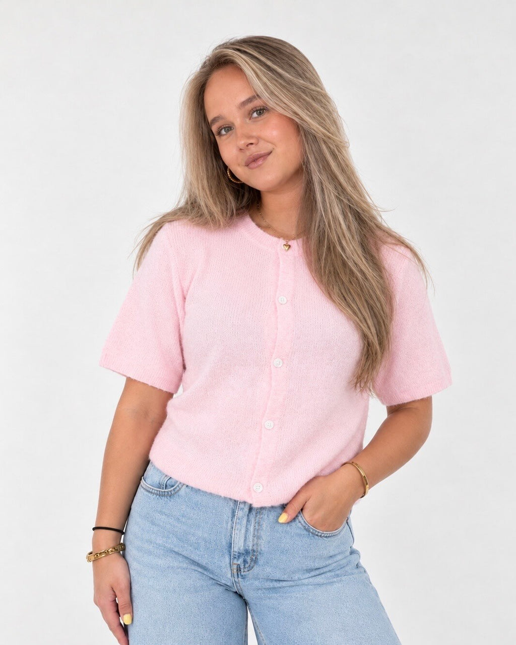Roze cardigan met knopen