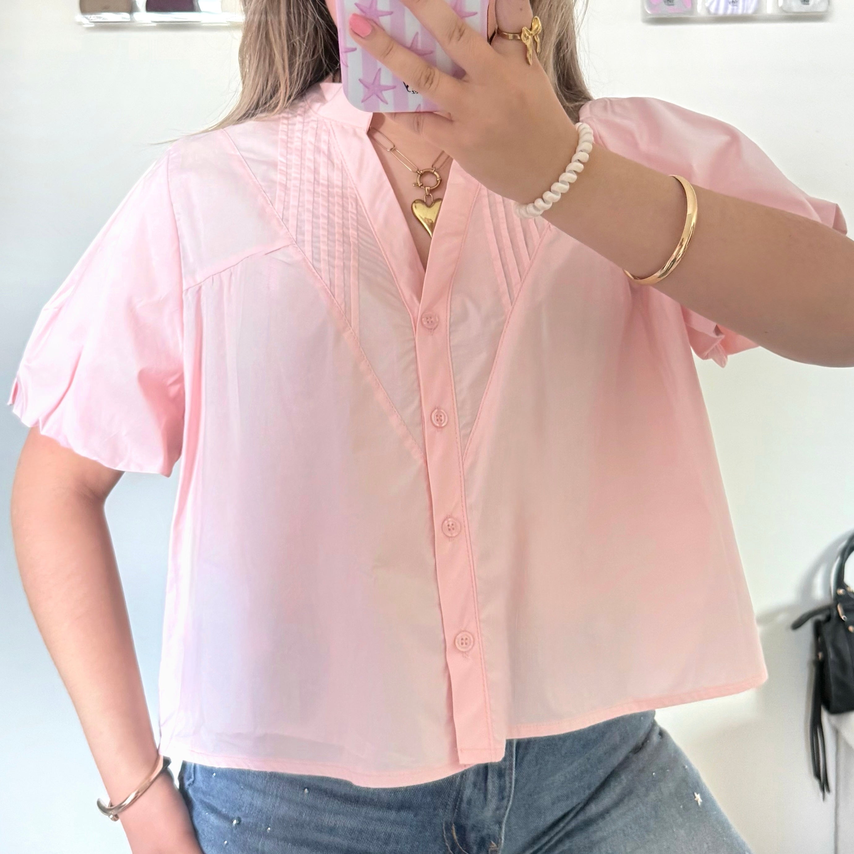 Roze blouse met pofmouwen