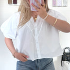 Witte blouse met pofmouwen