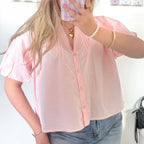 Roze blouse met pofmouwen