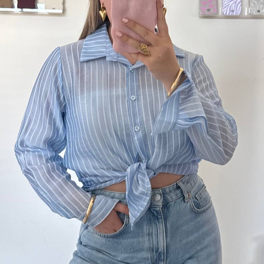 Lichtblauwe gestreepte blouse dames