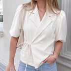 Korte blazer crème met strik