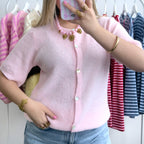 Roze cardigan met knopen 